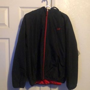 Avia Windbreaker. Fleece inside. Red inside and black outside. Size XL